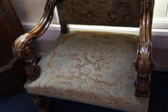 A pair of 19th century French Restauration style parcel gilt and carved beech armchairs, W.2ft 5in. D.2ft 3in. H.4ft 1in.